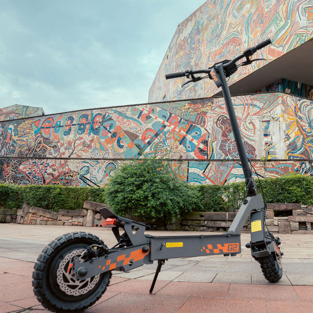Trottinette électrique G2 adulte pliable 48V 15,6Ah autonomie 55 km pneus tubeless 10 pouces double suspension freins à disque avant arrière