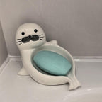 Porte-savon en céramique autodrainant, motif phoque