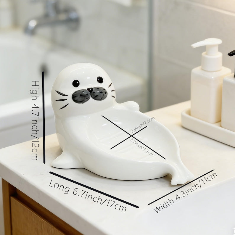 Porte-savon en céramique autodrainant, motif phoque